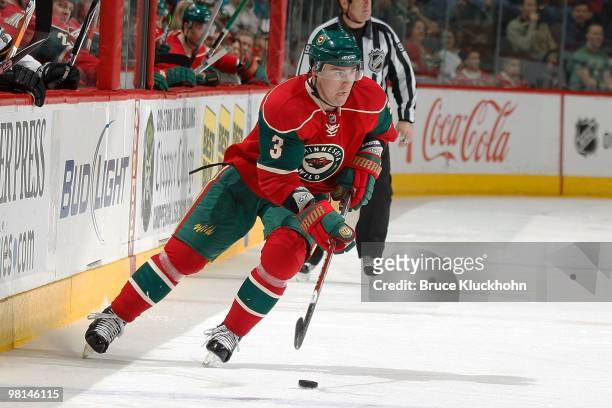 Marek Zidlicky of the Minnesota Wild skates with the puck against the San Jose Sharks during the game at the Xcel Energy Center on March 23, 2010 in...
