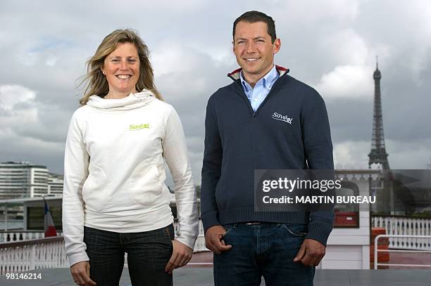British sailor Samantha Davies and French Romain Attanasio pose on March 30, 2010 in Paris, during a press conference to present the sailors ahead of...