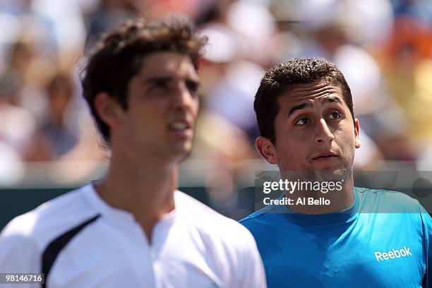 Nicolas Almagro of Spain plays against Thomaz Bellucci of Brazil during day eight of the 2010 Sony Ericsson Open at Crandon Park Tennis Center on...