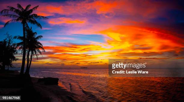 sunset at tanapaq beach, saipan, commonwealth of the northern mariana islands - northern mariana islands stock-fotos und bilder