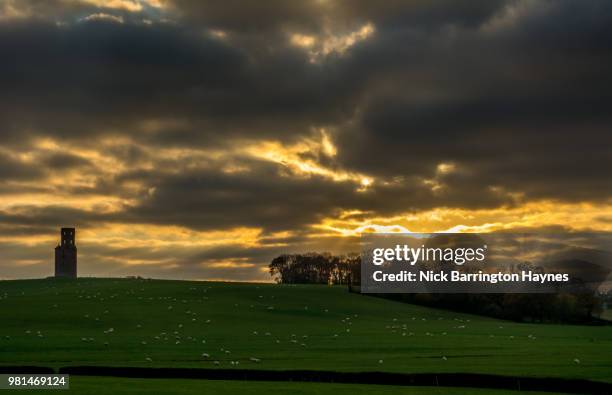 sunset over horton tower - nick haynes stock pictures, royalty-free photos & images