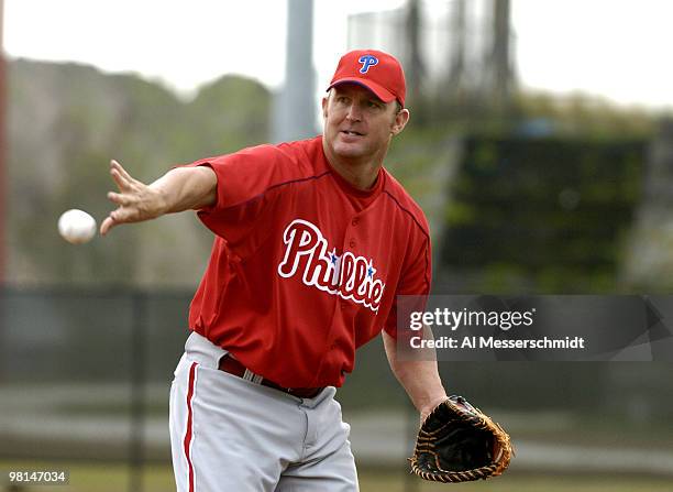 Philadelphia Phillies first baseman Jim Thome tosses a ball during spring training February 24, 2005 in Clearwater, Florida.