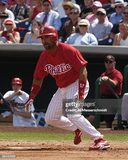 Philadelphia Phillies third baseman Placido Polanco bats against the Houston Astros in a spring training game March 7, 2005 in Clearwater, Florida....