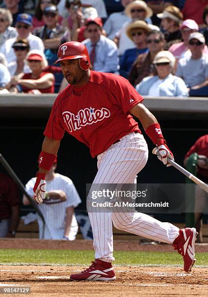 Philadelphia Phillies third baseman Placido Polanco bats against the Houston Astros in a spring training game March 7, 2005 in Clearwater, Florida....