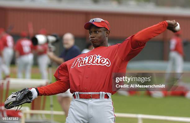 Philadelphia Phillies outfielder Kenny Lofton warms up during spring training February 24, 2005 in Clearwater, Florida.