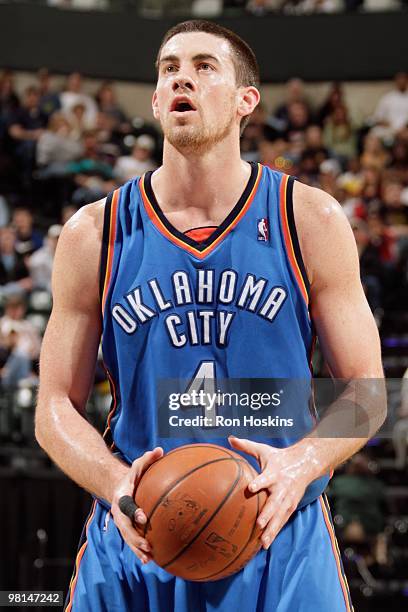 Nick Collison of the Oklahoma City Thunder shoots a free throw against the Indiana Pacers during the game on March 21, 2010 at Conseco Fieldhouse in...