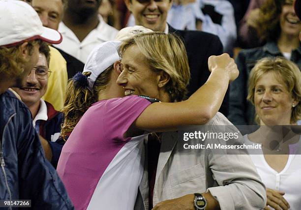 Svetlana Kuznetsova climbs into the stands to hug tennis great Martina Navratilova after defeating Elena Dementieva, 6-3, 7-5, in an all-Russian,...