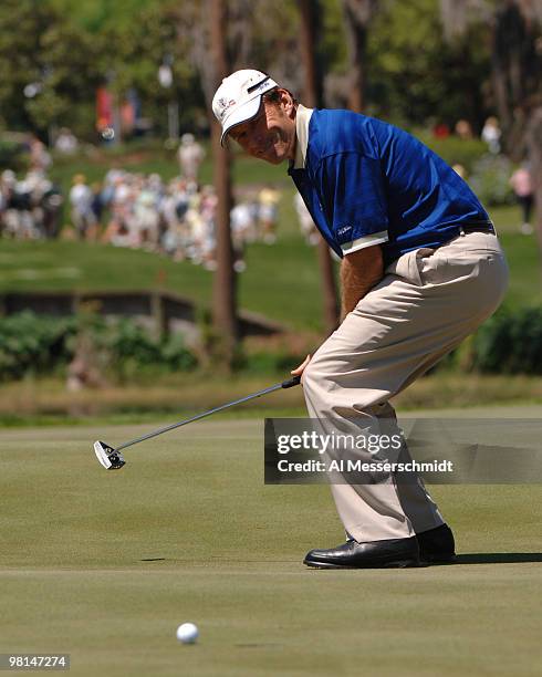 Nick Faldo bends for a birdie on the second hole during competition in the 2005 Tavistock Cup at Isleworth Country Club March 29.