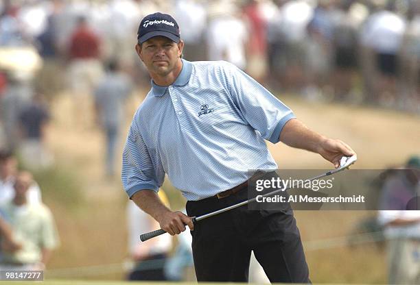 Retief Goosen checks a putt at Shinnecock Hills, site of the 2004 U. S. Open, during third-round play June 19, 2004. Goosen shot a 69 to lead the...