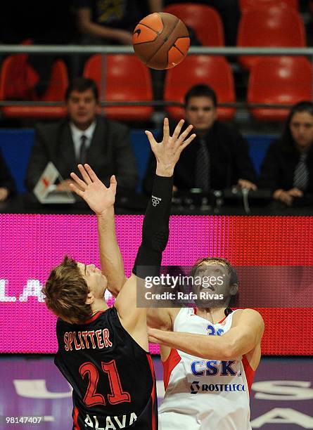 Dmitry Sokolov of CSKA Moscow competes with Tiago Splitter of Caja Laboral during the Euroleague Basketball 2009-2010 Play Off Game 3 between Caja...