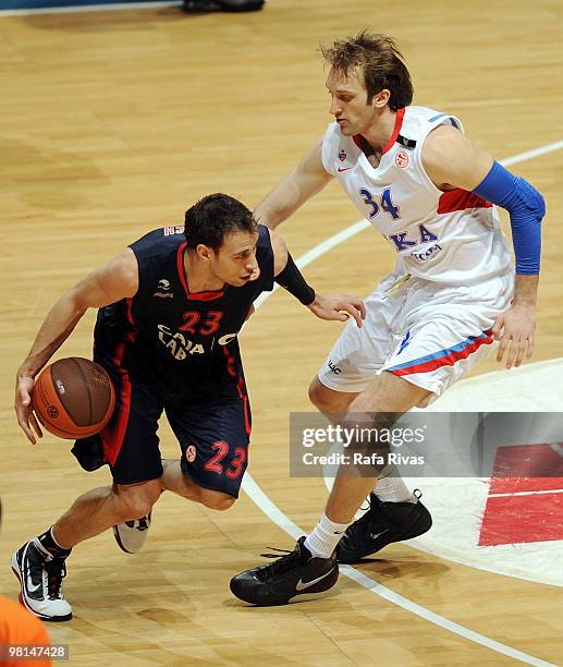 Carl English of Caja Laboral competes with Zoran Planinic of CSKA Moscow during the Euroleague Basketball 2009-2010 Play Off Game 3 between Caja...