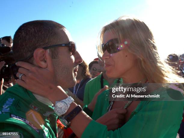 Tony Kanaan of Brazil drives to a second-place finish and receives a kiss from his wife, Dani, in the 2005 Honda Grand Prix of St. Petersburg April 3.