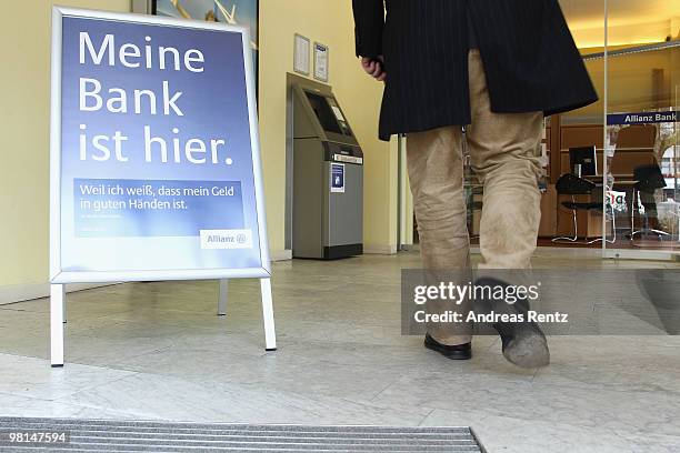 Customer walks in an Allianz bank on March 30, 2010 in Berlin, Germany. Allianz focused on their core market Germany under the brand name Allianz...