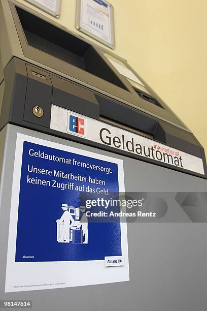 An ATM is pictured at a Allianz bank on March 30, 2010 in Berlin, Germany. Allianz focused on their core market Germany under the brand name Allianz...