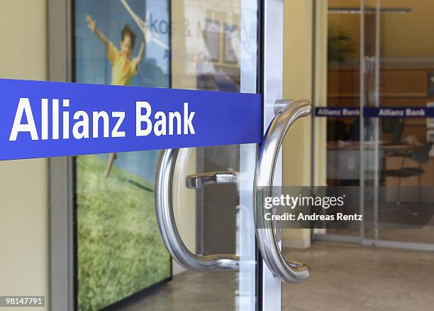 The entrance door stands open at an Allianz bank on March 30, 2010 in Berlin, Germany. Allianz focused on their core market Germany under the brand...