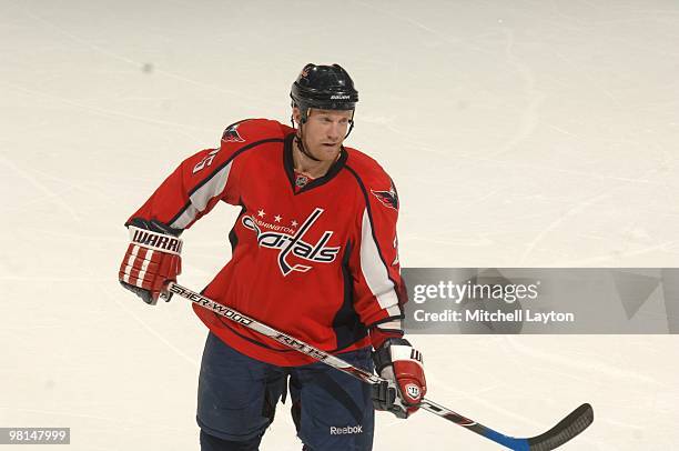 Jason Chimera of the Washington Capitals looks on during a NHL hockey game against the Pittsburgh Penguins on March 24, 2010 at the Verizon Center in...