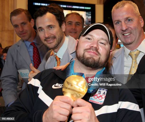 Steve Holcomb, pilot of the gold medal winning United States four-man bobsled team, visits the New York Stock Exchange on March 30, 2010 in New York...