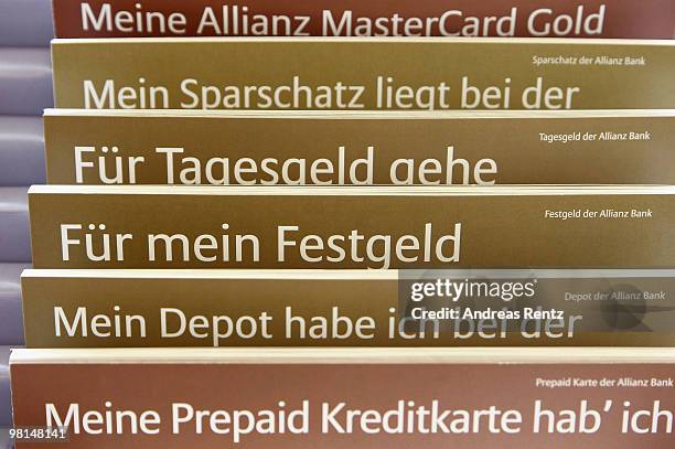 Information brochures are pictured at an Allianz bank on March 30, 2010 in Berlin, Germany. Allianz focused on their core market Germany under the...