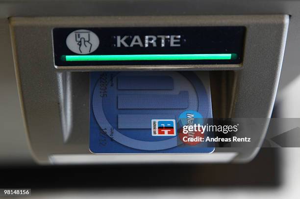 German debit card is seen in the slot of an ATM at an Allianz bank on March 30, 2010 in Berlin, Germany. Allianz focused on their core market Germany...