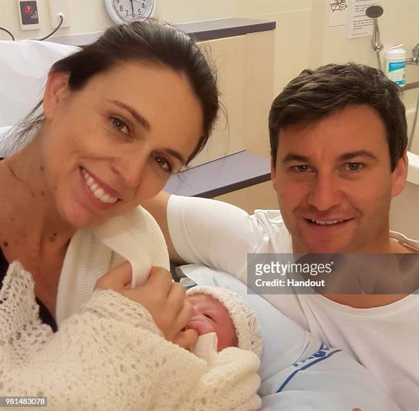 In this handout image provided by Office of the Prime Minister of New Zealand, New Zealand Prime Minister Jacinda Ardern and partner Clarke Gayford...