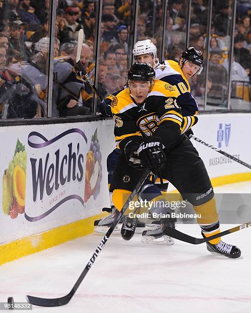 Blake Wheeler of the Boston Bruins skates after the puck against the Buffalo Sabres at the TD Garden on March 29, 2010 in Boston, Massachusetts.