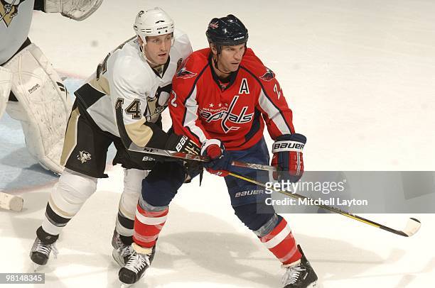 Brooks Orpik of the Pittsburgh Penguins protects the crease during a NHL hockey game against Mike Knuble of the Washington Capitals on March 24, 2010...