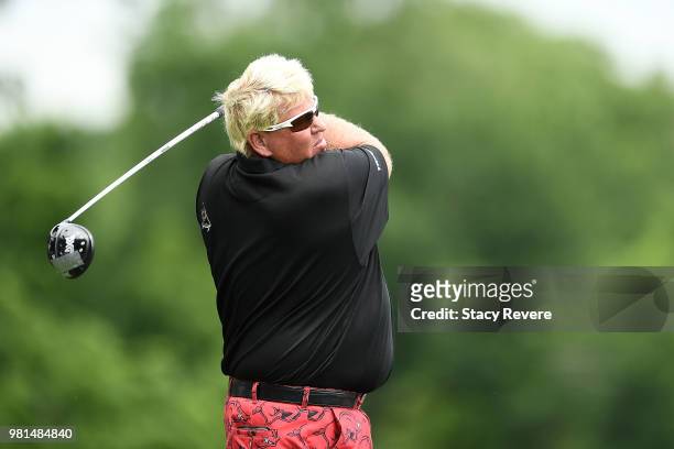 John Daly hits his tee shot on the second hole during the first round of the American Family Insurance Championship at University Ridge Golf Course...