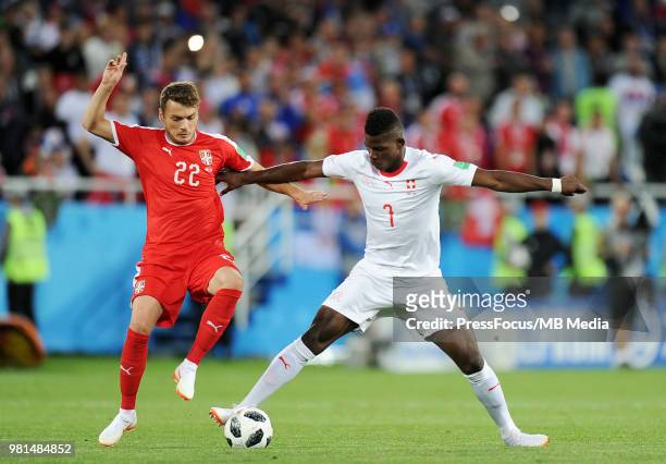 Adem Ljajic of Serbia competes with Breel Embolo of Switzerland during the 2018 FIFA World Cup Russia group E match between Serbia and Switzerland at...