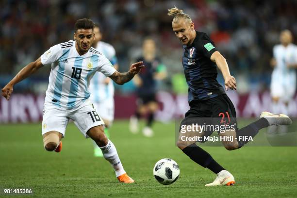 Domagoj Vida of Croatia and Eduardo Salvio of Argentina battle for the ball during the 2018 FIFA World Cup Russia group D match between Argentina and...