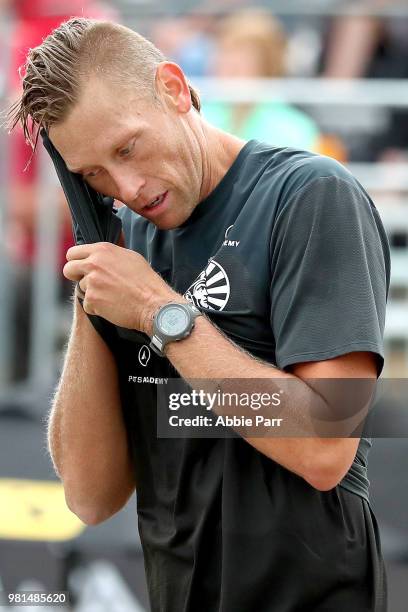 Stafford Slick reacts while competing against Maddison McKibbin and Riley McKibbin during opening rounds of the AVP Seattle Open at Lake Sammamish...