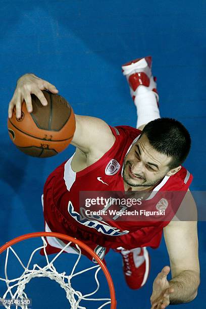 Linas Kleiza, #11 of Olympiacos Pireus in action during the Euroleague Basketball 2009-2010 Play Off Game 3 between Asseco Prokom Gdynia vs...