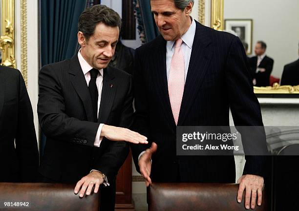 Sen. John Kerry shakes hands with French President Nicolas Sarkozy at the beginning of their meeting on Capitol Hill March 30, 2010 in Washington,...