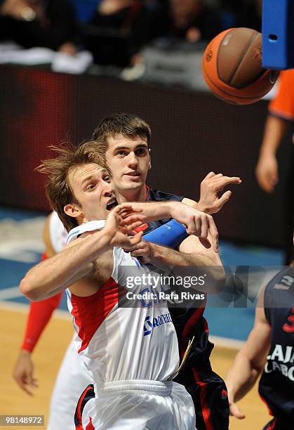 Zoran Planinic, #34 of CSKA Moscow competes with Stanko Barac, #42 of Caja Laboral during the Euroleague Basketball 2009-2010 Play Off Game 3 between...