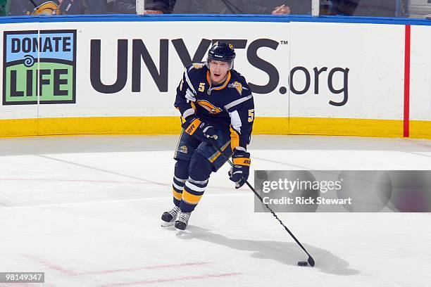 Toni Lydman of the Buffalo Sabres handles the puck against the Montreal Canadiens at HSBC Arena on March 24, 2010 in Buffalo, New York.