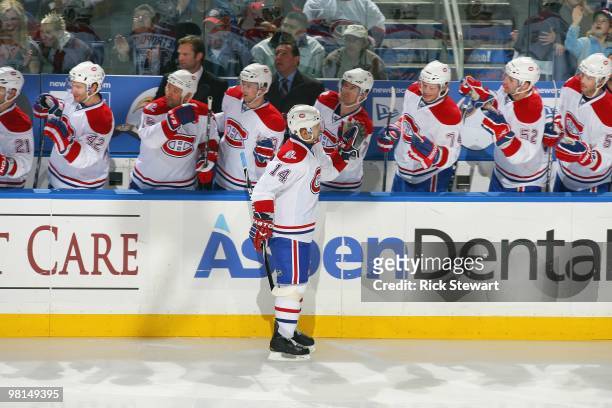 Tomas Plekanec of the Montreal Canadiens celebrates with teammates against the Buffalo Sabres at HSBC Arena on March 24, 2010 in Buffalo, New York.