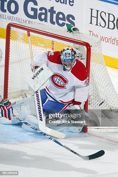 Goalie Carey Price of the Montreal Canadiens tries to block the net against the Buffalo Sabres at HSBC Arena on March 24, 2010 in Buffalo, New York.