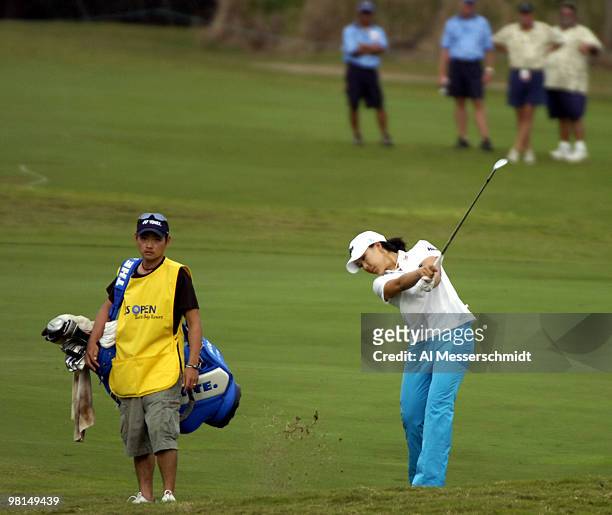 Tournament winner Joo Mi Kim hits the winning shot during a playoff into the 18th green during the final round of the 2006 SBS Open at Turtle Bay,...