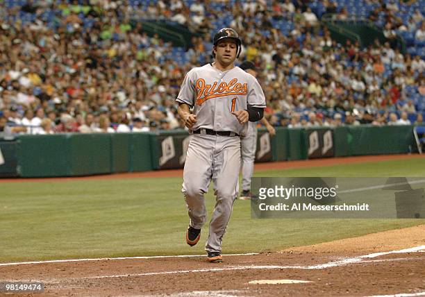 Baltimore Orioles second baseman Brian Roberts scores against the Tampa Bay Devil Rays July 23, 2006 in St. Petersburg. The Orioles defeated the Rays...