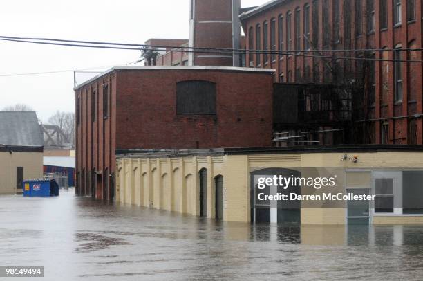 Flooded commercial building along Elmwood Avenue is seen as the Pawtuxett River over flows March 30, 2010 in Cranston, Rhode Island. The second major...