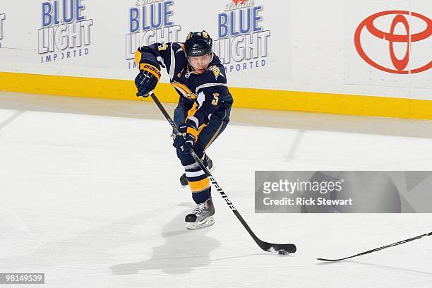 Toni Lydman of the Buffalo Sabres handles the puck during the game against the Montreal Canadiens at HSBC Arena on March 24, 2010 in Buffalo, New...
