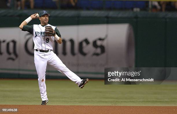 Tampa Bays Devil Rays shortstop Tomas Perez attempts an off-balance throw against the Baltimore Orioles July 23, 2006 in St. Petersburg. The runner...