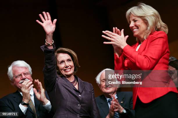 Jill Biden, wife of U.S. Vice Presidet Joseph Biden, right, and House Speaker Nancy Pelosi, a California Democrat, attend the Health Care and...