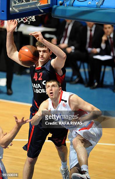 Caja Laboral's Stanko Barac vies with CSKA's Viktor Khryapa during a Euroleague basket match, on March 30 at Fernando Buesa Arena in Vitoria. Caja...