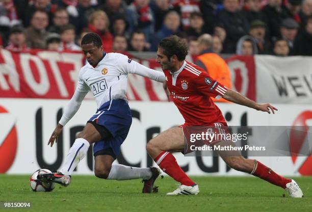 Patrice Evra of Manchester United in action against Hamit Altintop of Bayern Munich during the UEFA Champions League Quarter-Final First Leg match...