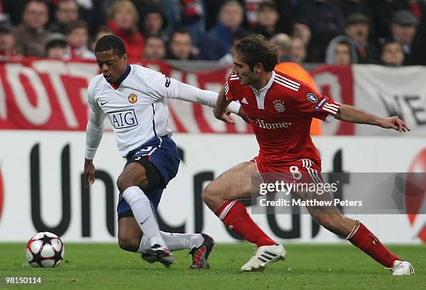 Patrice Evra of Manchester United in action against Hamit Altintop of Bayern Munich during the UEFA Champions League Quarter-Final First Leg match...