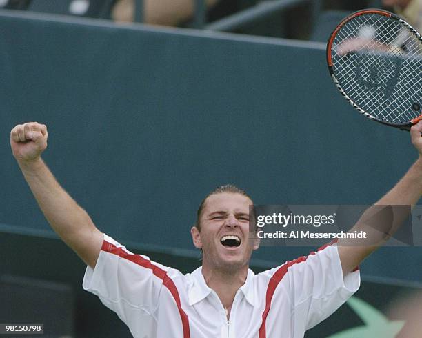 Mardy Fish celebrates match point and wins the second match in the 2004 David Cup semifinal September 24, 2004 at Daniel Island, South Carolina....