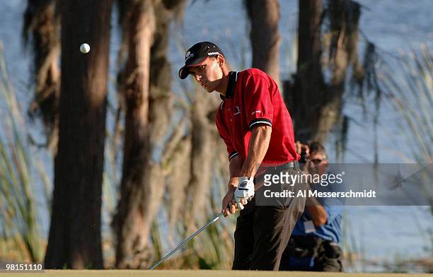Charles Howell III blasts from a bunker on the 17th hole in the 2005 Tavistock Cup at Isleworth Country Club March 29.