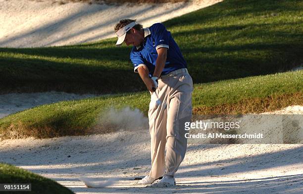 Ian Poulter plays from an 18th hole bunker in the 2005 Tavistock Cup at Isleworth Country Club March 29.