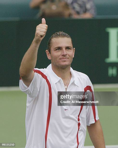 Mardy Fish gives fan a thumbs up after winning the second match in the 2004 David Cup semifinal September 24, 2004 at Daniel Island, South Carolina....