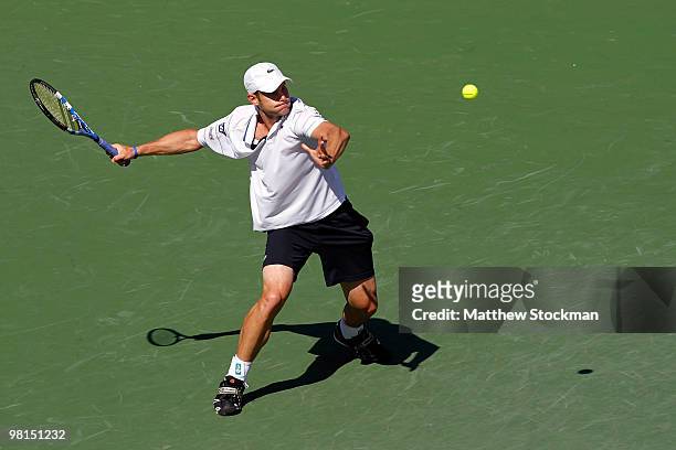 Andy Roddick of the United States returns a shot against Benjamin Becker of Germany during day eight of the 2010 Sony Ericsson Open at Crandon Park...